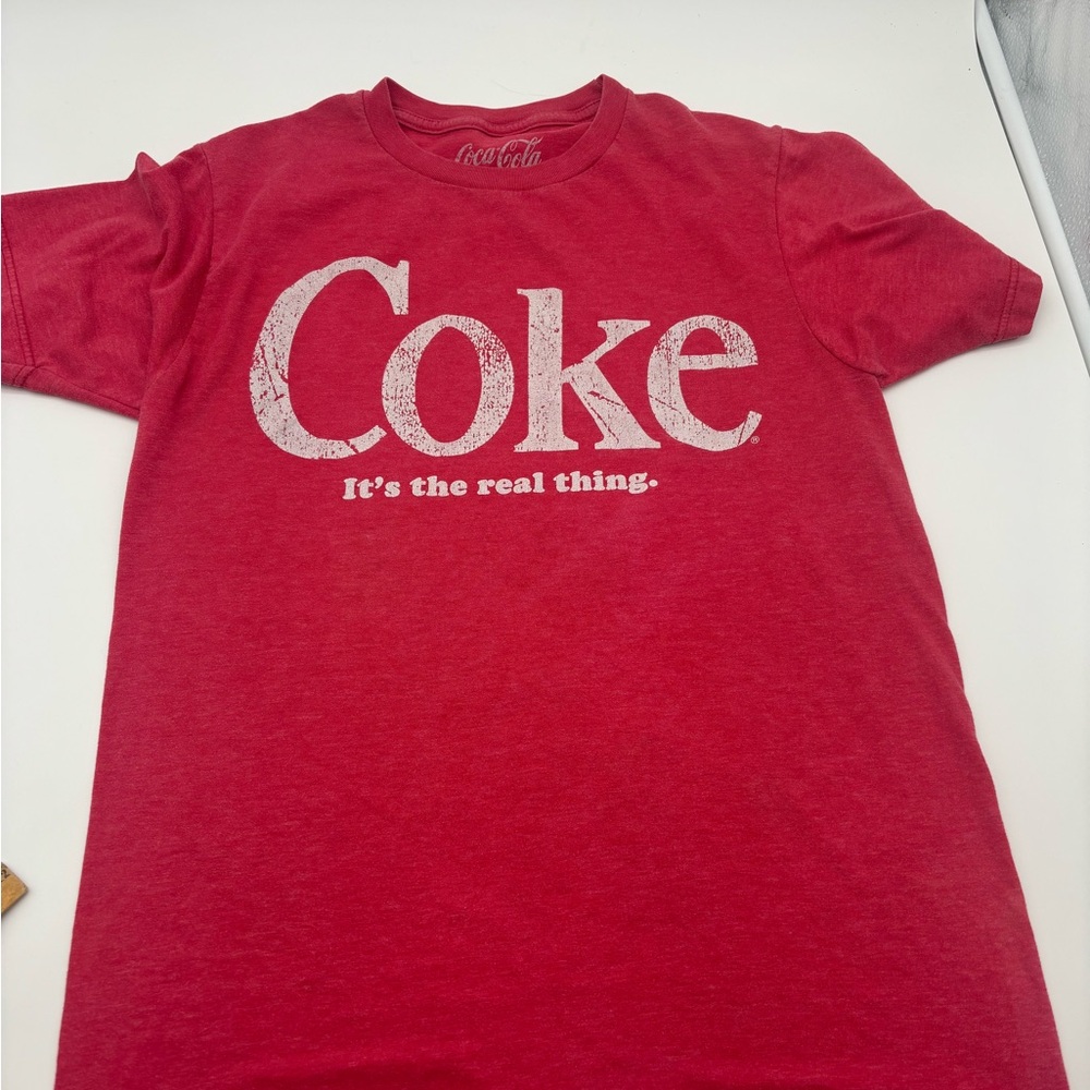 Coca-Cola Vintage Logo Tee in Faded Red with White Print